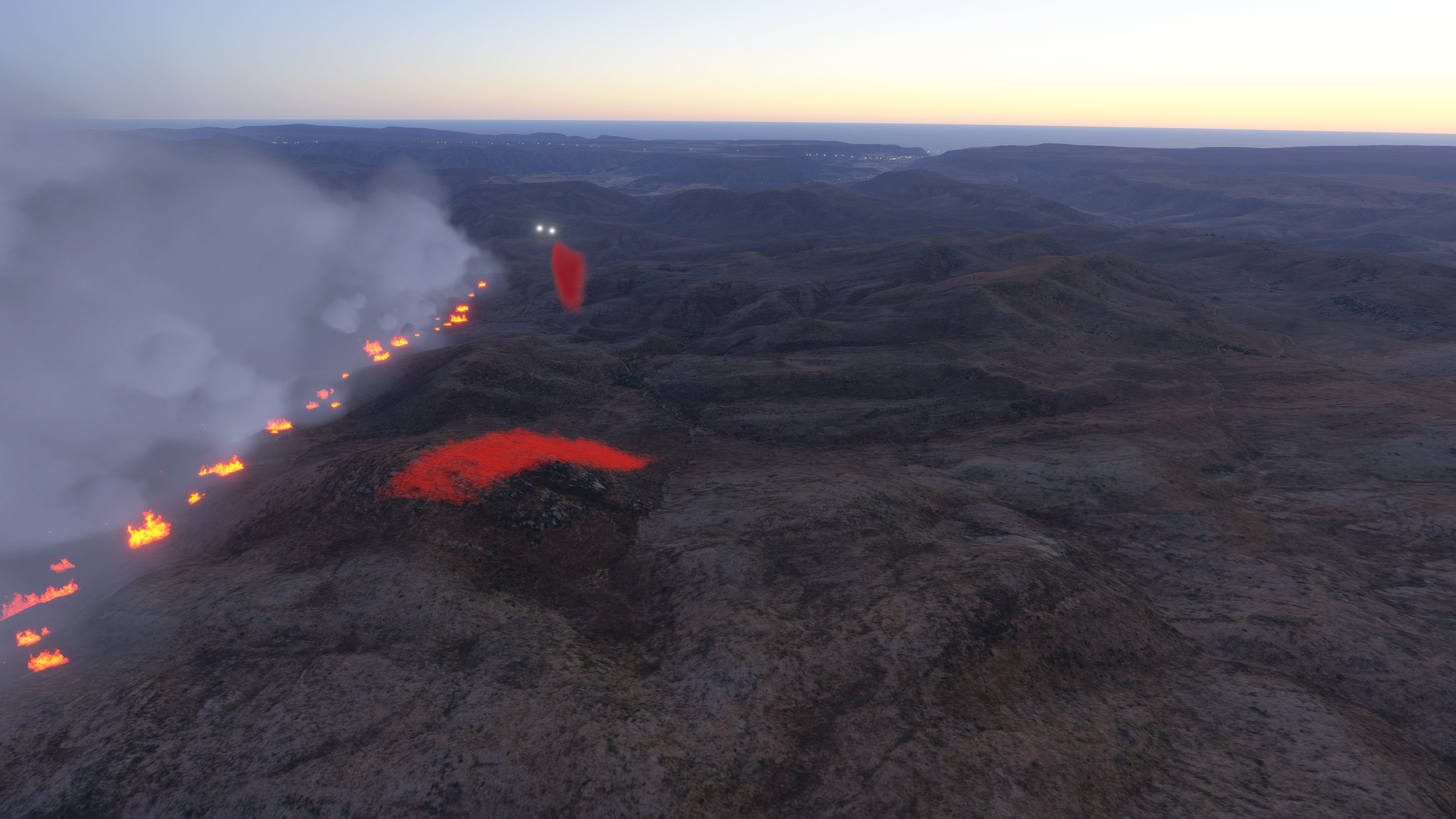 FS Fire v2 — a drifting fire line at dusk with red retardant laid across its path